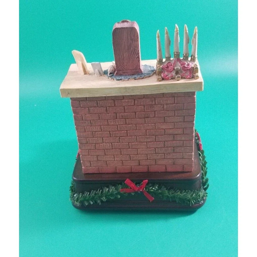 House Of Lloyd Crash Landing Music Box: plays Santa Claus Is Coming To Town EUC